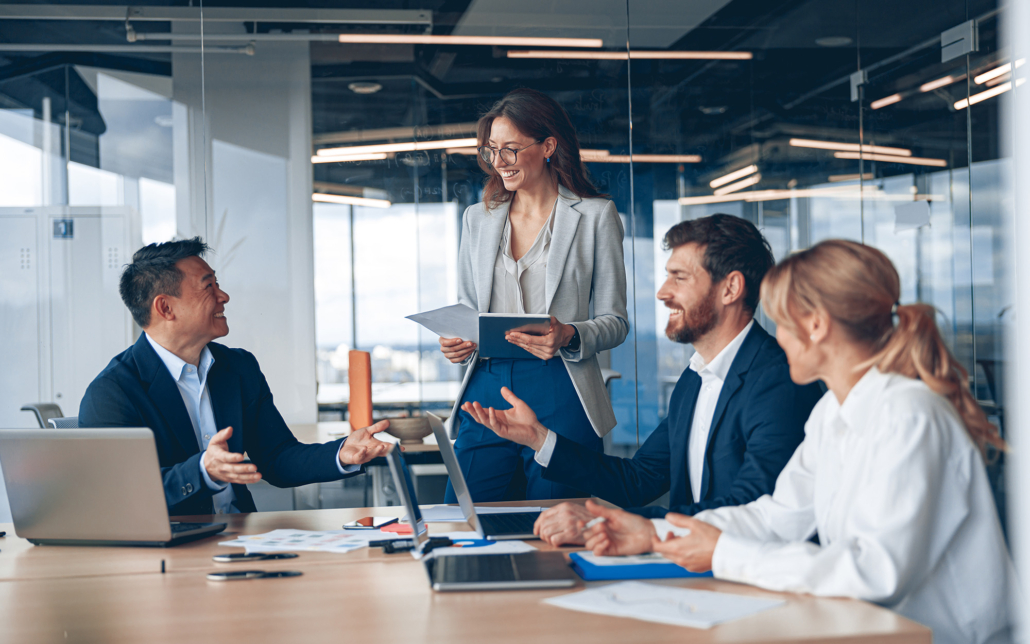 Business Professionals Talking In Meeting