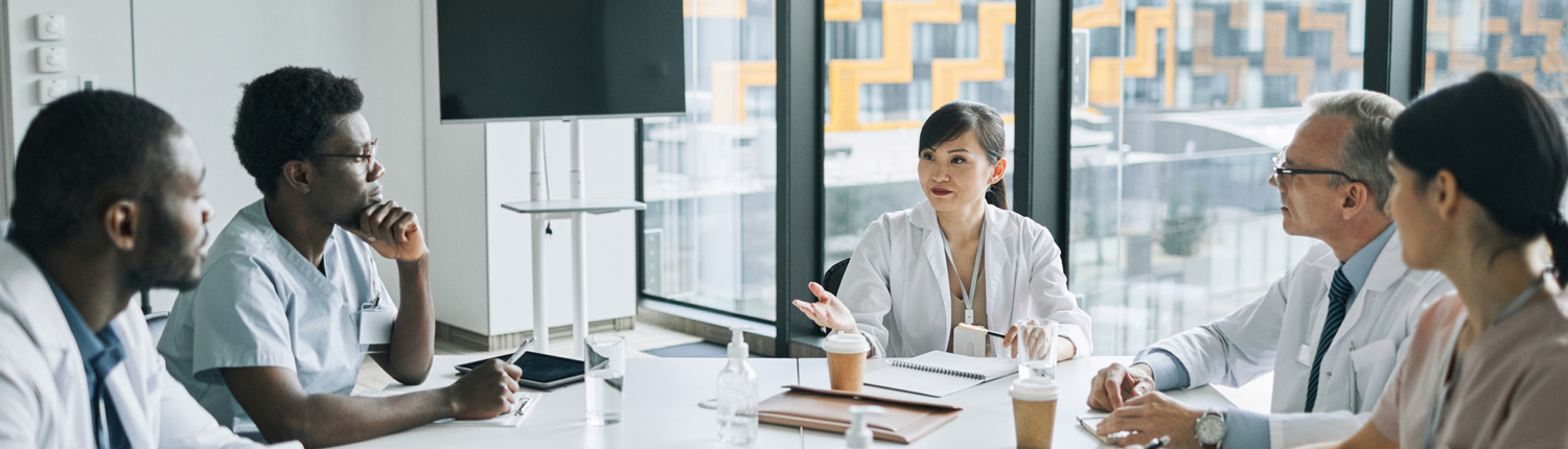 Medical Workers In Business Meeting